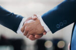 successful contract negotiate and handshake concept, two busines